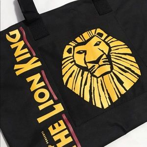 The lion king black gold and red canvas zipper closure tote bag 19/15in